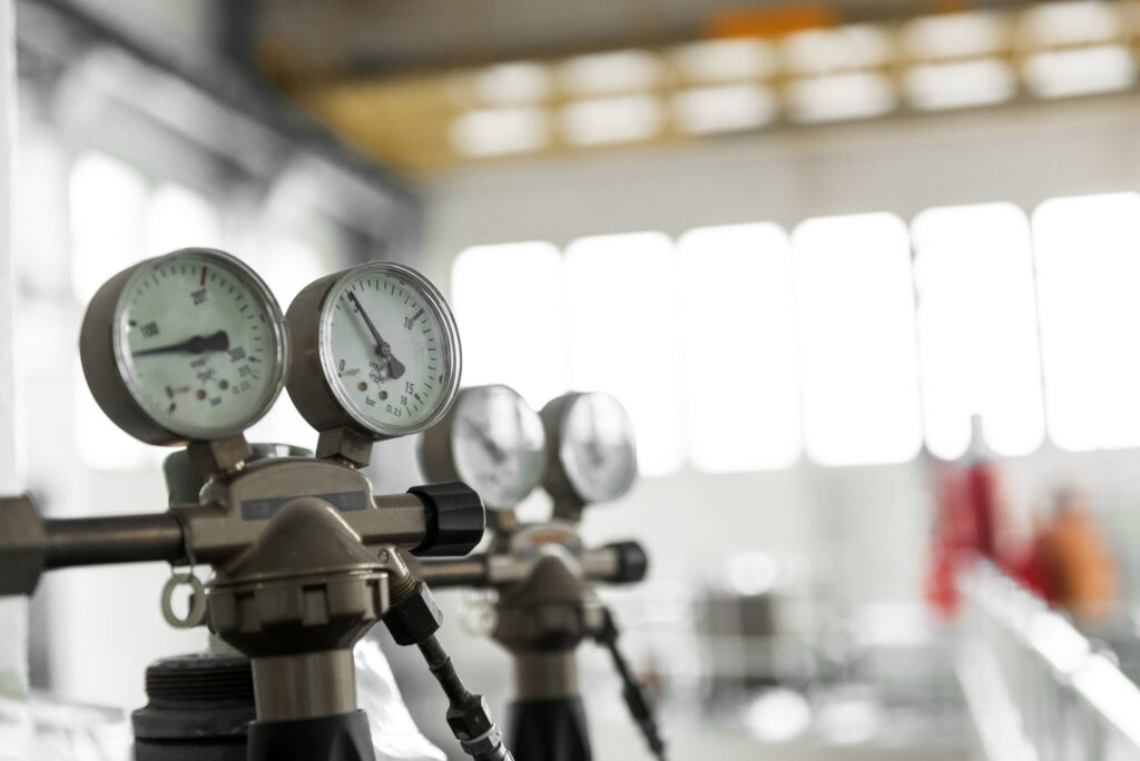 The image show an air compressor gauge.